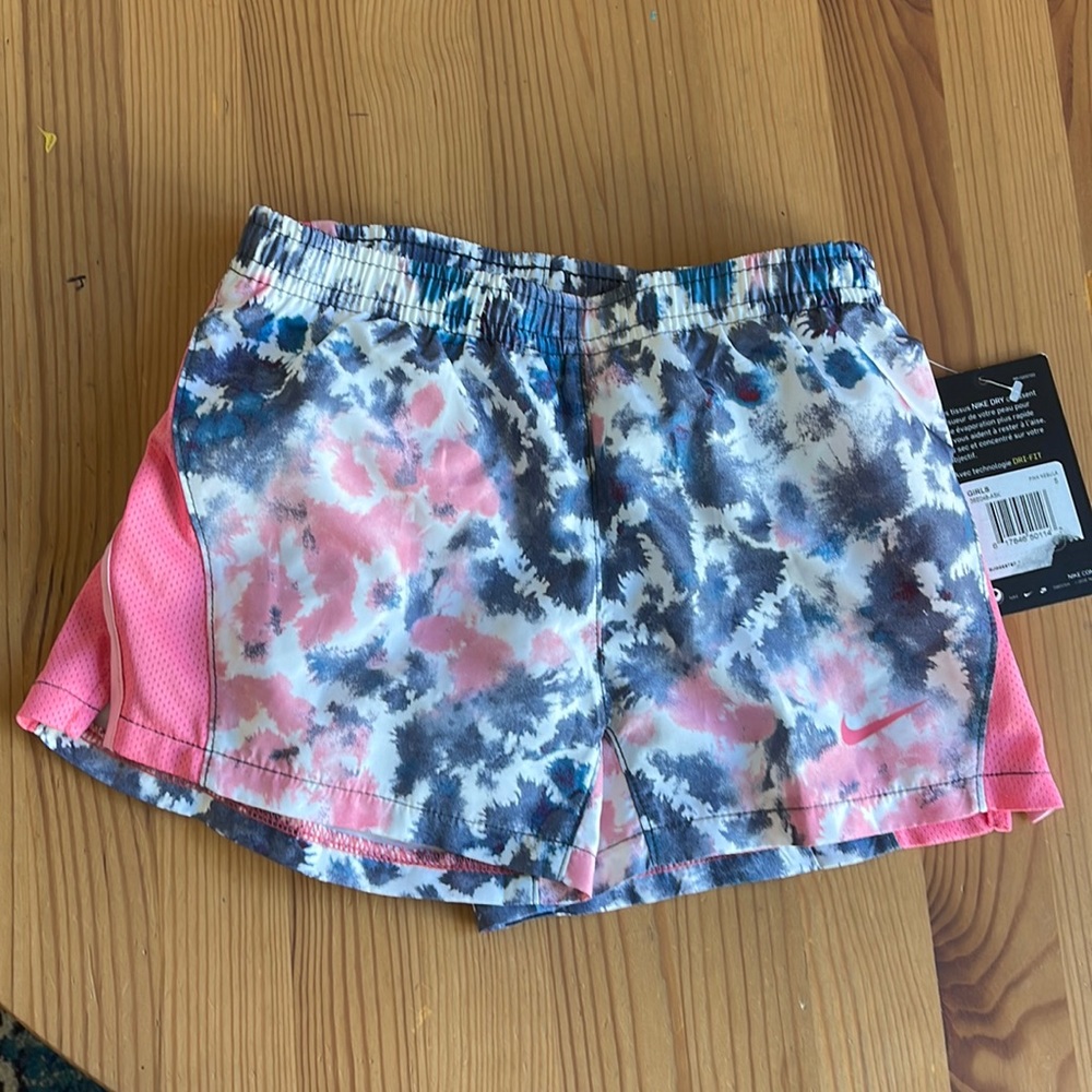 Girls Nike shorts. New with tags. Size 4-5.